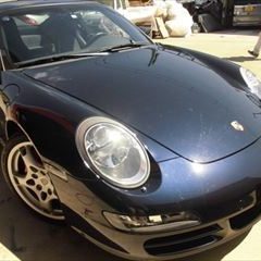 ポルシェの911（GH-997M9701）：傷の修理方法と費用　フロントバンパー脱着・分解、修理、塗装　作業工賃90,000円/合計金額（税込）97,200円