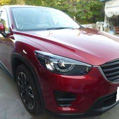 マツダのCX-5（LDA-KE2FW）：傷の修理方法と費用　フェンダーアーチモール交換　部品代金4,320円/右フェンダー、右フェンダーステー板金、フロントバンパー、右ヘッドランプ脱着修理、塗装　作業工賃96,500円/合計金額（税込）108,885円