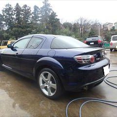 マツダのRX8（ABA-SE3P）：傷の修理方法と費用　左リアバンパー（素地）交換　部品代金3,810円／左リアフェンダー、左リアバンパーの修理費用、塗装　作業工賃100,000円／合計金額（税込）112,114円